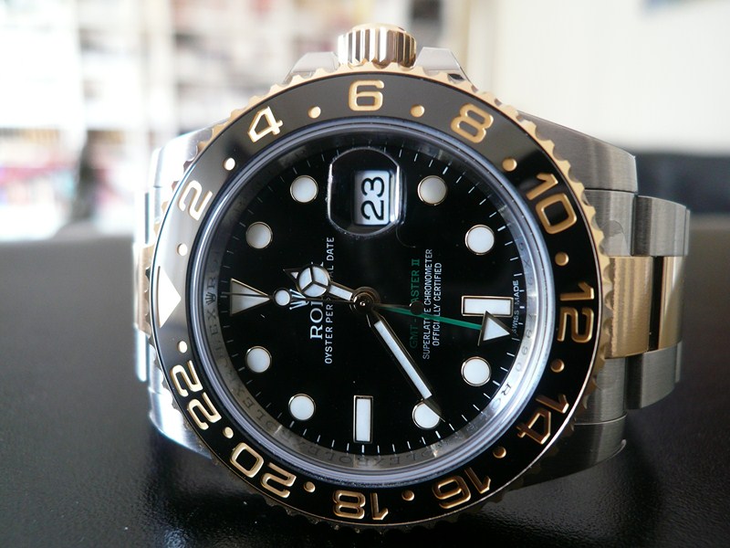 ROLEX GMT MASTER II CERAMIQUE OR ET ACIER
 	 
