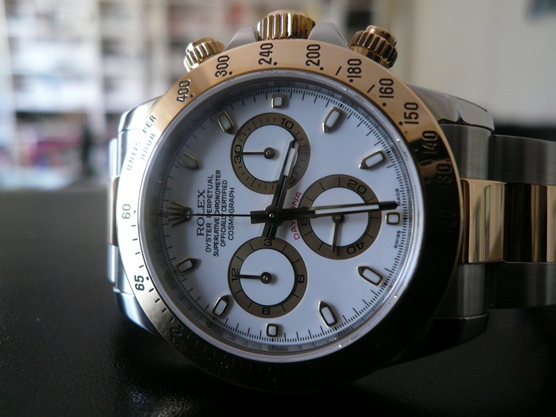 ROLEX DAYTONA OR ET ACIER
 	 
