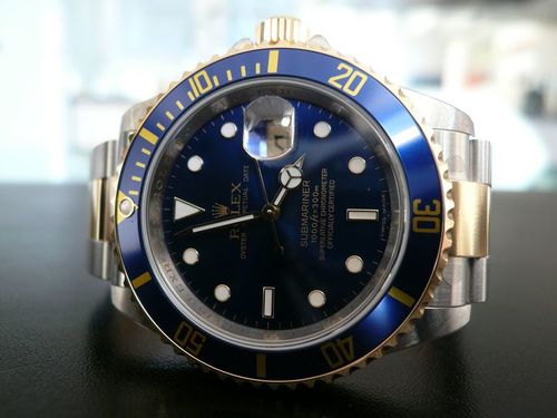 ROLEX SUBMARINER-DATE OR ET ACIER