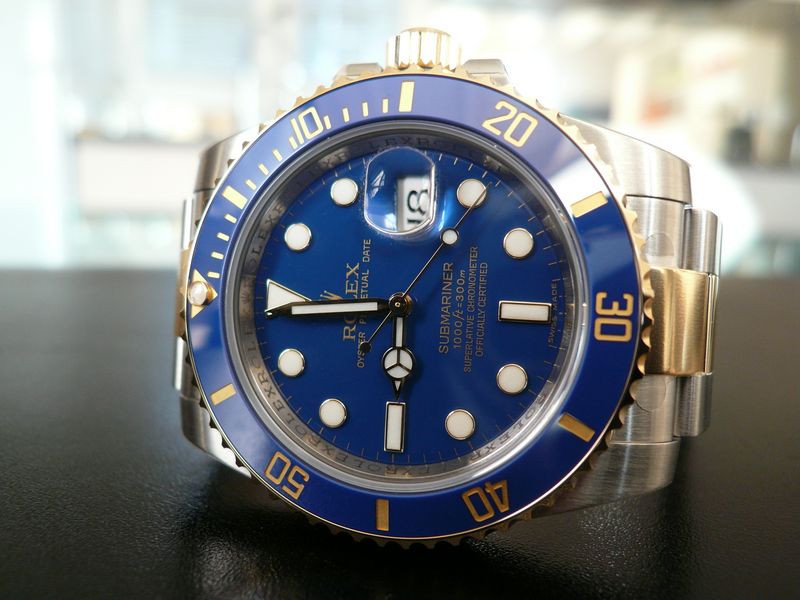 ROLEX SUBMARINER-DATE OR ET ACIER CERAMIQUE
 	 
