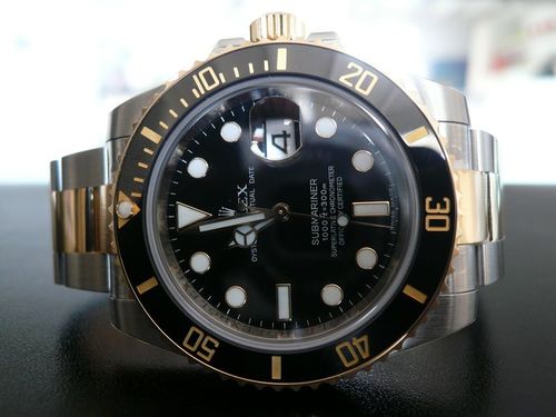 ROLEX SUBMARINER-DATE OR ET ACIER CERAMIQUE