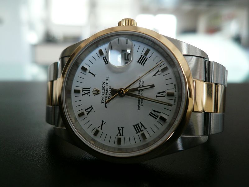 ROLEX OYSTER DATE OR ET ACIER
 	 
