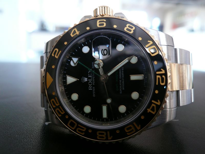 ROLEX GMT MASTER II CERAMIQUE OR ET ACIER
 	 
