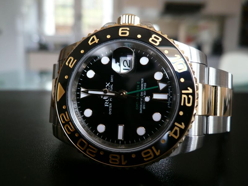 ROLEX GMT MASTER II CERAMIQUE OR ET ACIER
 	 
