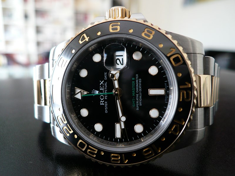 ROLEX GMT MASTER II CERAMIQUE OR ET ACIER
 	 
