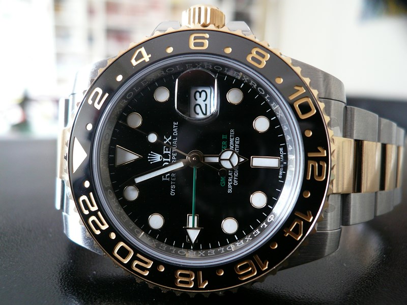 ROLEX GMT-MASTER II CERAMIQUE OR ET ACIER
 	 
