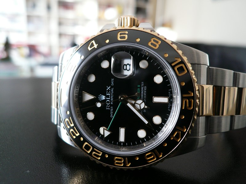 ROLEX GMT MASTER II CERAMIQUE OR ET ACIER
 	 
