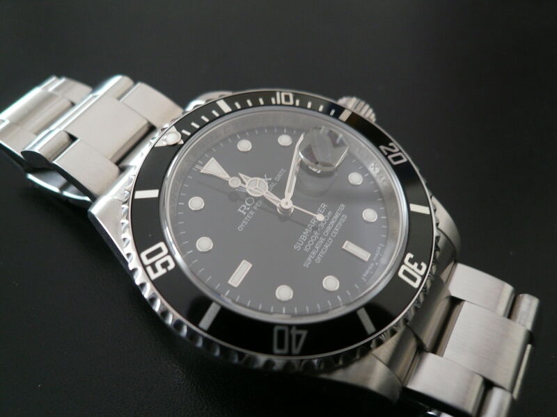 photo n°2 : ROLEX SUBMARINER DATE AVEC RÉHAUT GRAVÉ